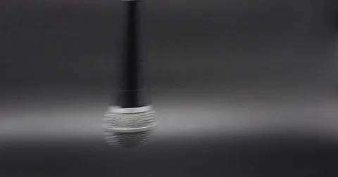 Microphone Swinging Falling And Dropped Isolated On Grey, 4K Stock Footage 69790740