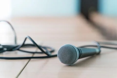 Microphone on a table in an empty classroom for lectures Stock Photos