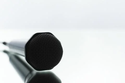 The microphone is on the table. Journalism concept. Stock Photos