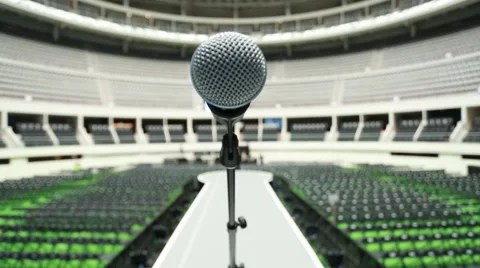 Microphone on top of runway between rows of seats at empty venue before a show Stock Footage 40020670