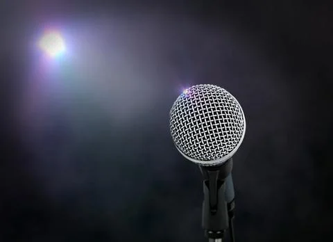Microphone under spotlight Stock Photos