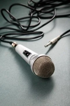 Microphone with a wire on a ridge background Stock Photos