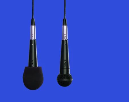 Microphones hanging side by side Stock Photos