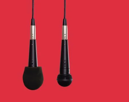 Microphones hanging side by side Stock Photos