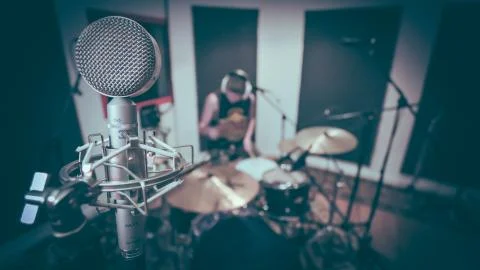 Microphones in Studio playing drums Stock Photos