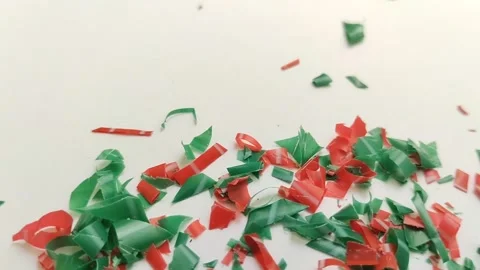 Microplastic particles on white background. plastic pieces Stock Footage 312535363
