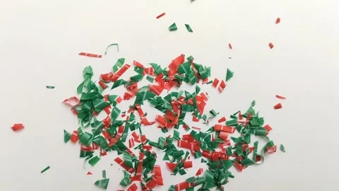 Microplastic particles on white background. plastic pieces Stock Footage 312535410