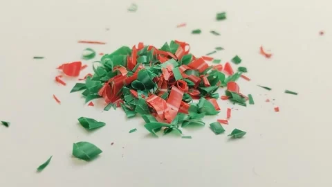 Microplastic particles on white background. plastic pieces Stock Footage 312535414