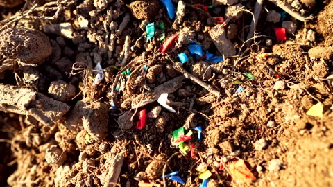 Microplastic pollution. Microplastics in ground. Video stock 278222141
