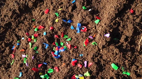 Microplastic pollution. Microplastics in ground. Video stock 278223008