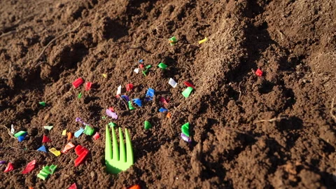 Microplastic pollution. Microplastics in ground. Stock Footage 278223191