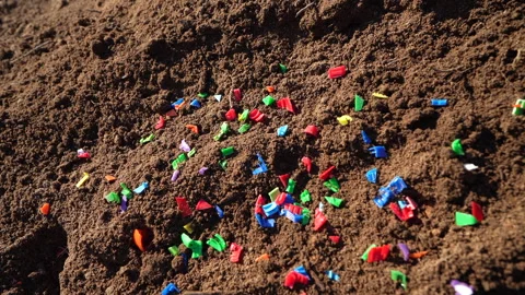 Microplastic pollution. Microplastics in ground. Video stock 278474154