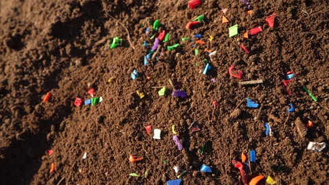 Microplastic pollution. Microplastics in ground. Video stock 278475987