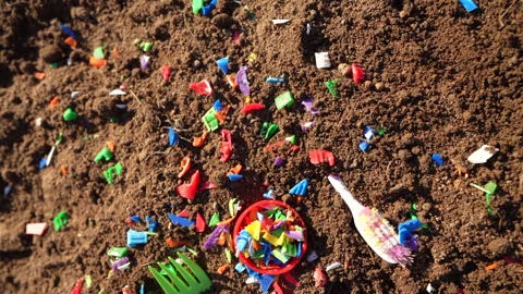 Microplastic pollution. Microplastics in ground. Soil microplastics Stock Footage 278475966