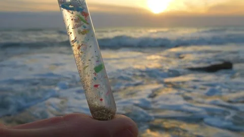 Microplastics in the oceans, microplastic research. Colorful plastic particles Vidéo 243744874
