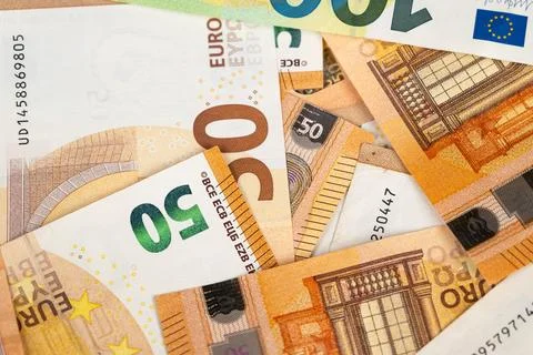 Microprinted euro bills with security threads captured in macro shot. Close.. Stock Photos