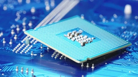 Microprocessor on Blue printed circuit board, Zoom in tracking motion. Stock Footage 170459023
