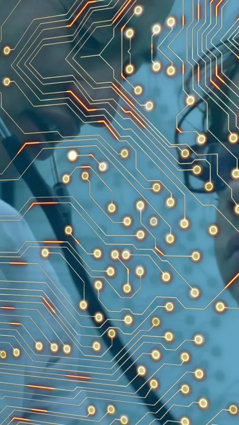 Microprocessor connections against asian male doctor examining caucasian boy at Stockbeeldmateriaal 322891954