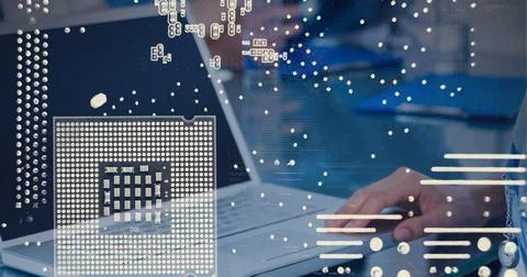 Microprocessor connections against mid section of person using laptop at office Stockfoto's