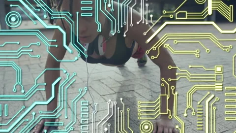 Microprocessor connections against woman performing push up exercise Stock Footage 141535282