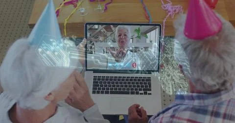 Microprocessor connections key icon against senior couple having a image call at 스톡 사진