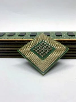 Microprocessor CPU on a stack of RAM memory chips closeup isolated on white b 스톡 사진