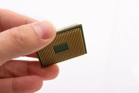 Microprocessor in hand. Stockfoto's
