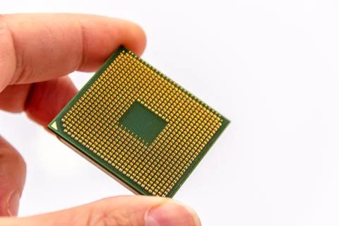 Microprocessor in hand. Photos