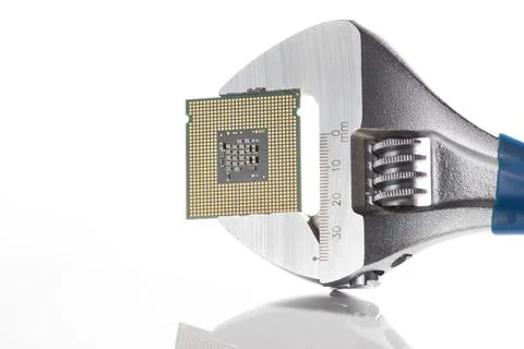 Microprocessor in wrench, isolated on white. 写真素材
