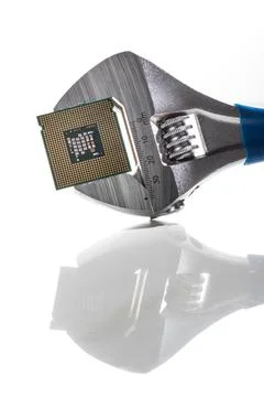 Microprocessor in wrench, isolated on white. Foto stock