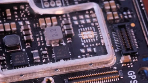 Microprocessors, tracking shot. Computer PC chip microchip blue light close up. Video stock 249048060