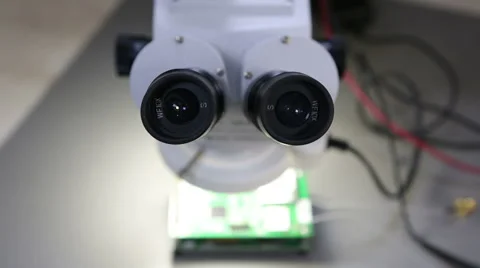 Microscope and  microchip. camera blurred  and normal. Stock Footage 46142757