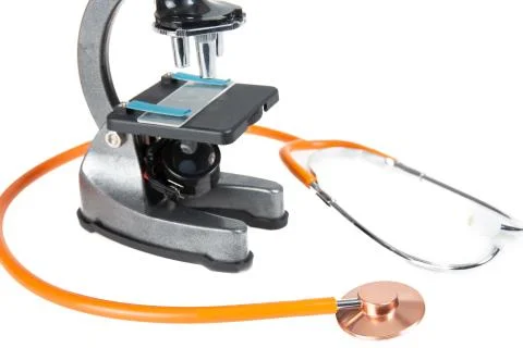 Microscope and  stethoscope in white background health examination and medica Stock Photos