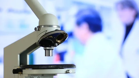 Microscope on the background of laboratory Stock Footage 114387016