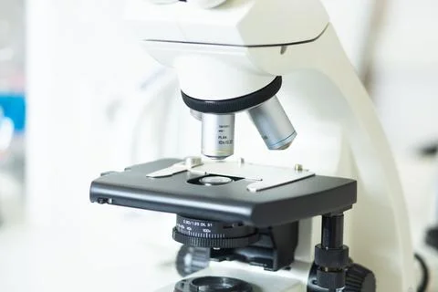 Microscope at the biology laboratory Stock Photos