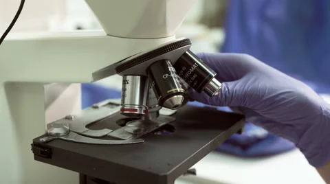 Microscope blood testing and analysis at modern medical laboratory Stock Footage 59518620
