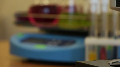 Microscope on the blurred laboratory background panning close up Stock Footage 63045770