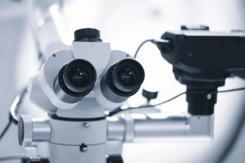 Microscope with built-in camera, Two eyepieces of a large microscope, Profess Stock Photos
