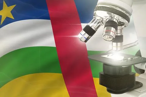 Microscope on Central African Republic flag -  science concept Illustrazione stock