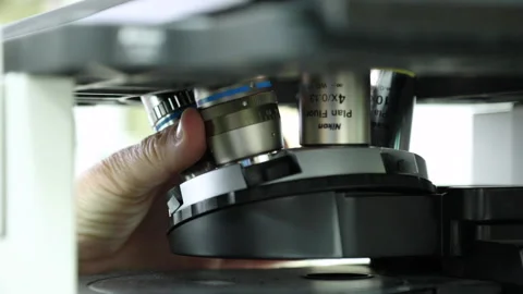 Microscope changing lens Stock Footage 145362101