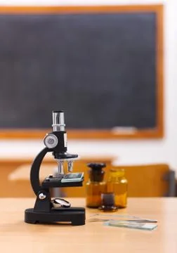 Microscope in class room Stock Photos