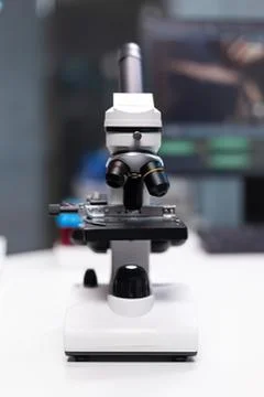 Microscope on a clean lab table Stock Photos