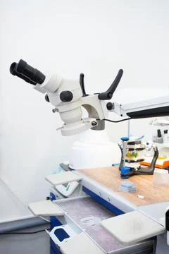 Microscope in a dental laboratory, a technician's workplace in a dental Stock Photos