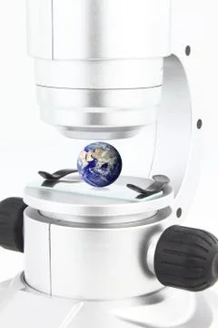Microscope with the globe on the viewing platform Stock Photos