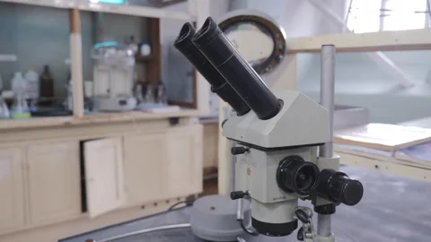 Microscope isolated on white background, science and technology concept Vídeo Stock 152755042