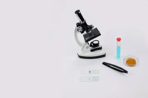 Microscope with lab equipment  Stock Photos