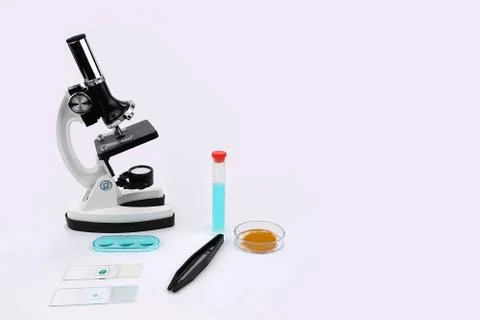 Microscope with lab equipment  Stock Photos