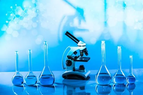 Microscope, Laboratory beakers,Science experiment Stock Photos