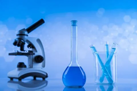 Microscope, Laboratory beakers,Science experiment Stock Photos