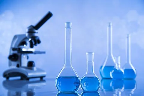 Microscope, Laboratory beakers,Science experiment Stock Photos